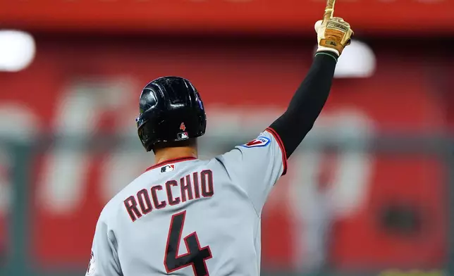 Cleveland Guardians' Brayan Rocchio celebrates as he runs the bases after hitting a solo home run during the seventh inning of a baseball game against the Kansas City Royals, Saturday, Sept. 26, 2026, in Kansas City, Mo. (AP Photo/Charlie Riedel)