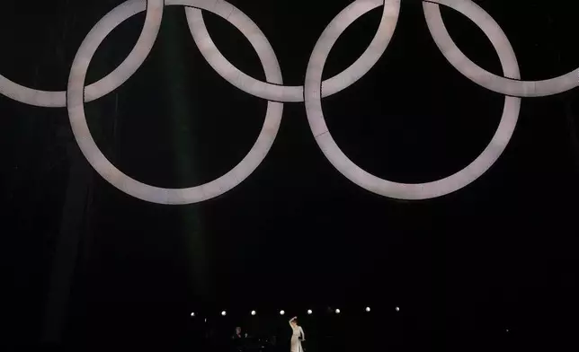 FILE - Celine Dion performs in Paris, France, during the opening ceremony of the 2024 Summer Olympics, July 26, 2024. (AP Photo/Thibault Camus, File)