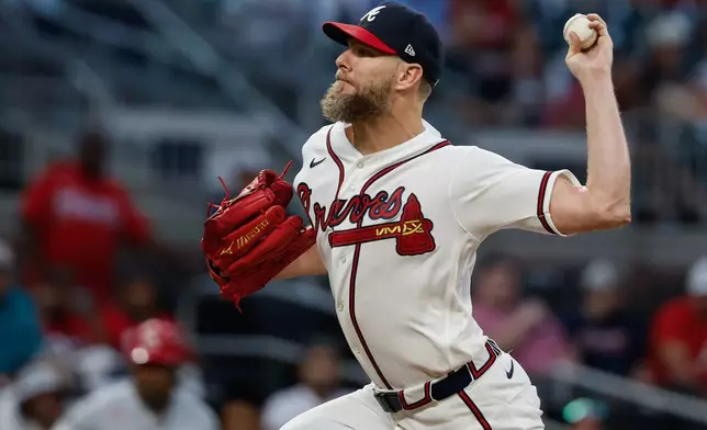 Atlanta Braves pitcher Chris Sale (51) delivers to a Cincinnati Reds batter during the first inning of a baseball game, Wednesday, Sept. 23, 2026, in Atlanta. (AP Photo/Erik S. Lesser)