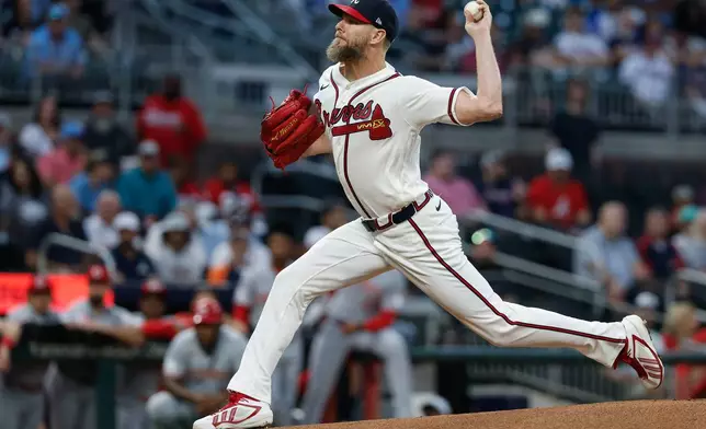 Atlanta Braves pitcher Chris Sale (51) delivers to a Cincinnati Reds batter during the first inning of a baseball game, Wednesday, Sept. 23, 2026, in Atlanta. (AP Photo/Erik S. Lesser)