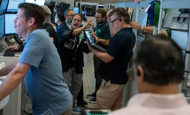 Options trader Anthony Spina works on the floor of the New York Stock Exchange, Thursday, Aug. 27, 2026, in New York. (AP Photo/Yuki Iwamura)