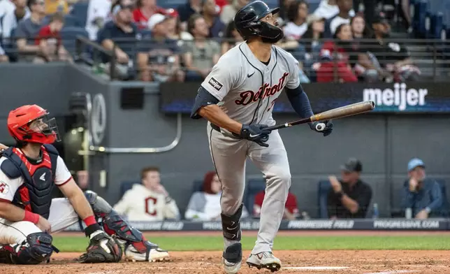 Detroit Tigers' Riley Greene watches his solo home run off Cleveland Guardians starting pitcher Parker Messick as catcher Austin Hedges looks on during the sixth inning of a baseball game, Saturday, Sept. 5, 2026, in Cleveland. (AP Photo/Phil Long)