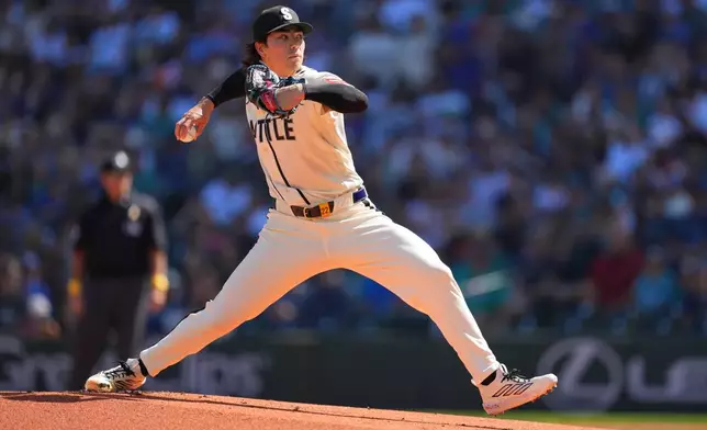 Seattle Mariners starting pitcher Bryan Woo throws during first inning of a baseball game against the Athletics, Sunday, Sept. 6, 2026, in Seattle. (AP Photo/Eric Hiller)