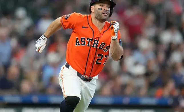 Houston Astros' Jose Altuve runs up the line on his home run off Atlanta Braves starting pitcher Martin Perez during the fourth inning of a baseball game, Sunday, Sept. 20, 2026, in Houston. (AP Photo/Karen Warren)