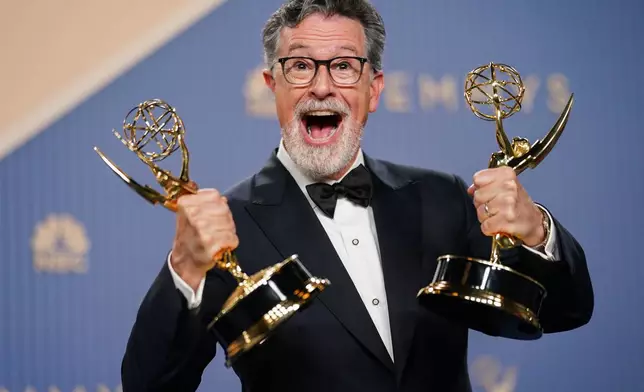 Stephen Colbert poses in the press room with the award for outstanding variety series for "The Late Show with Stephen Colbert" during the 78th Emmy Awards on Monday, Sept. 14, 2026, at the JW Marriott in Los Angeles. (Photo by Richard Shotwell/Invision/AP)