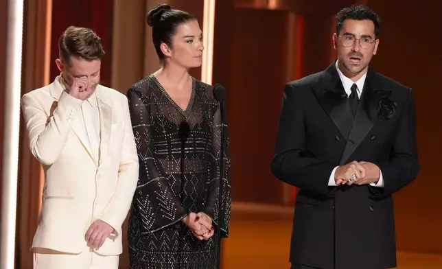 Macaulay Culkin, from left, Annie Murphy, and Dan Levy pay tribute to Catherine O'Hara during the 78th Emmy Awards on Monday, Sept. 14, 2026, at the Peacock Theater in Los Angeles. (AP Photo/Chris Pizzello)