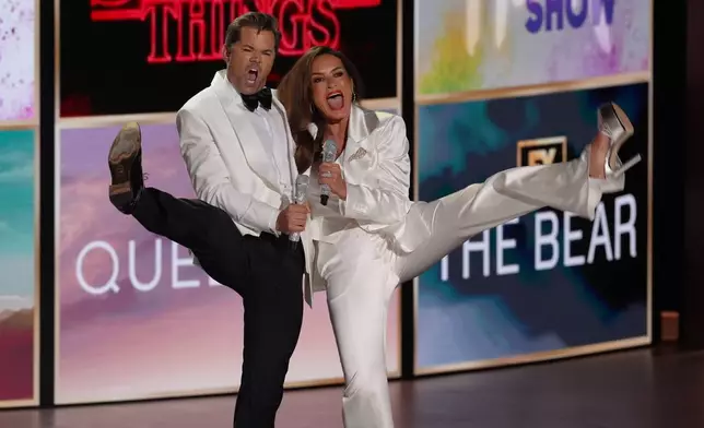 Andrew Rannells, left, and Host Mariska Hargitay perform during the 78th Emmy Awards on Monday, Sept. 14, 2026, at the Peacock Theater in Los Angeles. (AP Photo/Chris Pizzello)