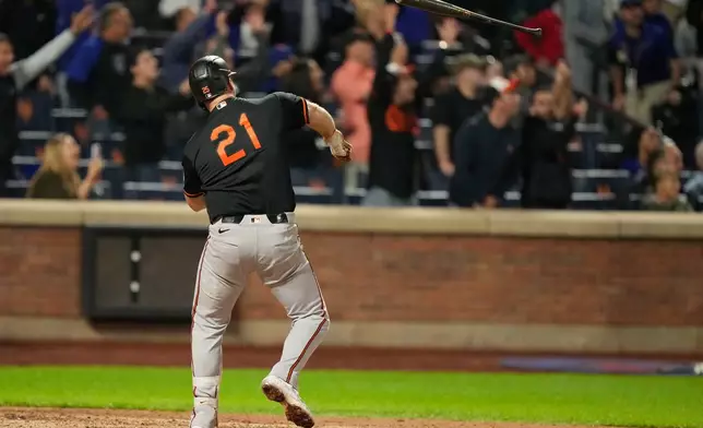 Baltimore Orioles' Pete Alonso throws his bat after hitting a solo home run during the ninth inning of a baseball game against the New York Mets, Tuesday, Sept. 15, 2026, in New York. (AP Photo/Seth Wenig)
