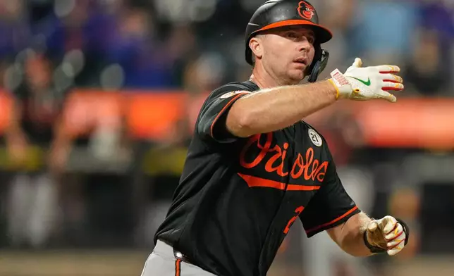 Baltimore Orioles' Pete Alonso reacts after hitting a solo home run during the ninth inning of a baseball game against the New York Mets, Tuesday, Sept. 15, 2026, in New York. (AP Photo/Seth Wenig)