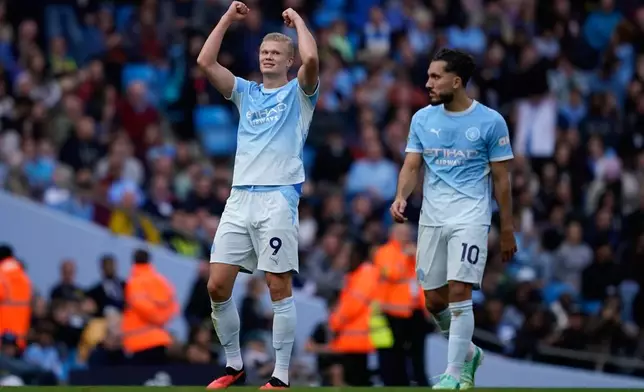 Manchester City's Erling Haaland celebrates after scoring the fifth goal during the English Premier League soccer match between Manchester City and Sunderland in Manchester, England, Sunday, Sept. 20, 2026. (AP Photo/Dave Thompson)