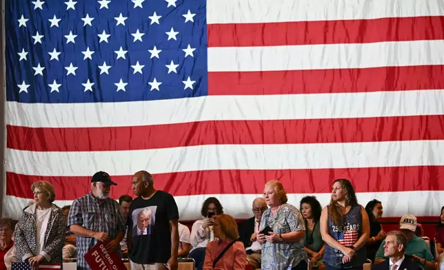 Attendees wait for Vice President JD Vance to arrive at a rally at Koury Convention Center in Greensboro, N.C., Monday, Sept. 21, 2026. (Kent Nishimura/Pool Photo via AP)