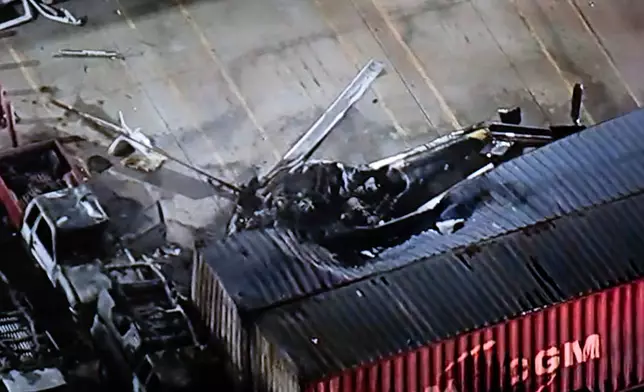 In this still image provided by KABC-TV shows a helicopter that crashed near a deadly bus crash, in Los Angeles on Tuesday, Sept. 15, 2026. (KABC-TV via AP)