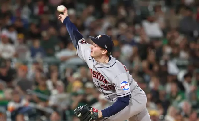 Houston Astros pitcher Hayden Wesneski throws to the Athletics during the seventh inning of a baseball game Saturday, Sept. 26, 2026, in West Sacramento, Calif. (AP Photo/Sara Nevis)