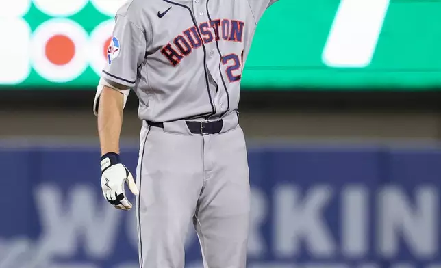 Houston Astros' Lucas Spence celebrates after hitting an RBI double during the seventh inning of a baseball game against the Athletics, Saturday, Sept. 26, 2026, in West Sacramento, Calif. (AP Photo/Sara Nevis)