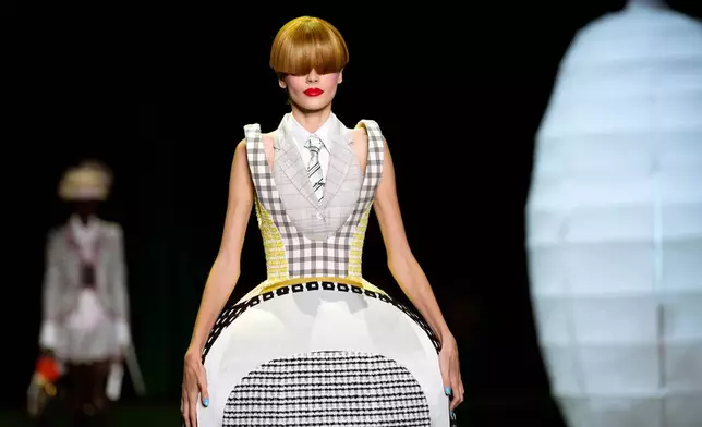 A model walks the runway during the Thom Browne Spring/Summer 2027 presentation as part of New York Fashion Week on Tuesday, Sept. 15, 2026, in New York. (Photo by Charles Sykes/Invision/AP)