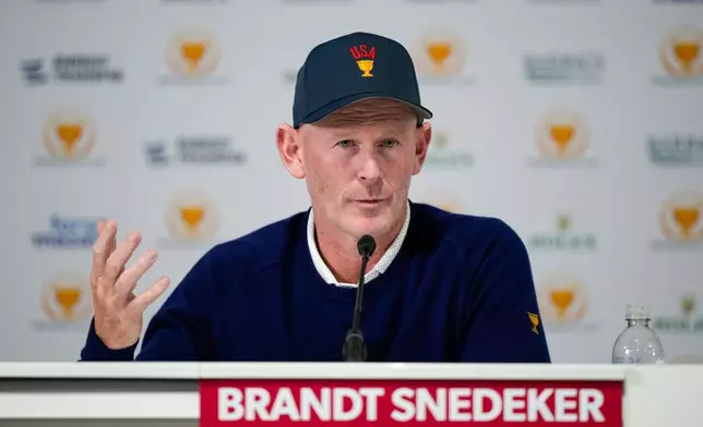 USA team Captain Brandt Snedeker speaks during the four-ball match Captain's Pairings event prior to the start of the Presidents Cup golf tournament against the International team at Medinah Country Club, Wednesday, Sept. 23, 2026, in Medinah, Ill. (AP Photo/Matt Slocum)
