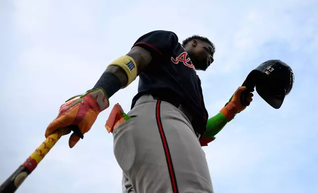 Atlanta Braves' Ronald Acuna Jr. gets ready before a baseball game against the Washington Nationals, Tuesday, Sept. 1, 2026, in Washington. (AP Photo/Nick Wass)