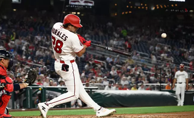 Washington Nationals' Yohandy Morales hits a home run during the third inning of a baseball game against the Atlanta Braves, Tuesday, Sept. 1, 2026, in Washington. (AP Photo/Nick Wass)