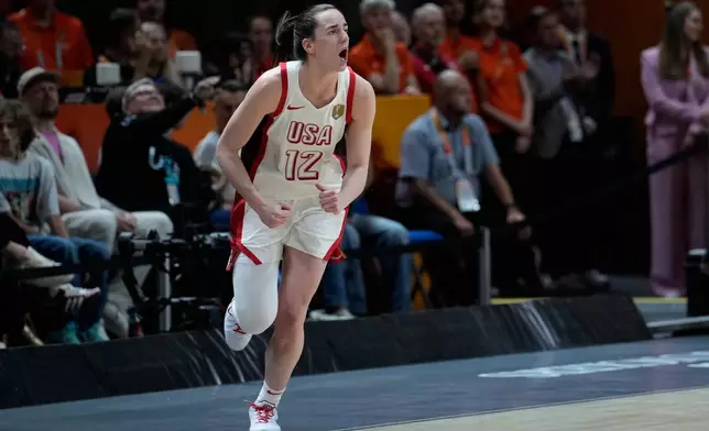 Caitlin Clark of the United States, reacts during the Women's Basketball World Cup final match between the United States and France in Berlin, Sunday, Sept. 13, 2026. (AP Photo/Ebrahim Noroozi)