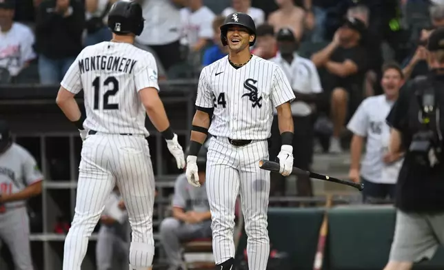 Chicago White Sox's Colson Montgomery (12) celebrates with teammate Braden Montgomery (24) after hitting a solo home run during the first inning of a baseball game against the Minnesota Twins Saturday, Sept. 5, 2026, in Chicago. (AP Photo/Paul Beaty)