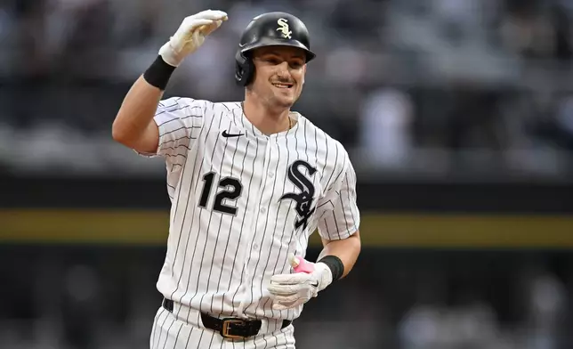 Chicago White Sox's Colson Montgomery celebrates while rounding the bases after hitting a solo home run during the first inning of a baseball game against the Minnesota Twins Saturday, Sept. 5, 2026, in Chicago. (AP Photo/Paul Beaty)
