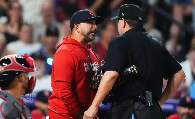 St. Louis Cardinals manager Oliver Marmol, right, argues after he was ejected from the game by home plate umpire Doug Eddings in the sixth inning of a baseball game against the Colorado Rockies Friday, Sept. 4, 2026, in Denver. (AP Photo/David Zalubowski)