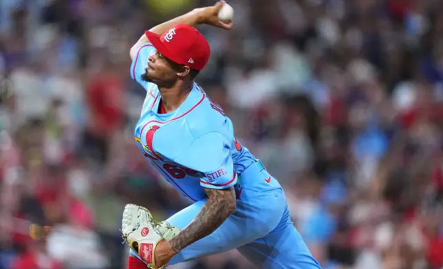 St. Louis Cardinals relief pitcher Hancel Rincon works against the Colorado Rockies in the sixth inning of a baseball game Saturday, Sept. 5, 2026, in Denver. (AP Photo/David Zalubowski)