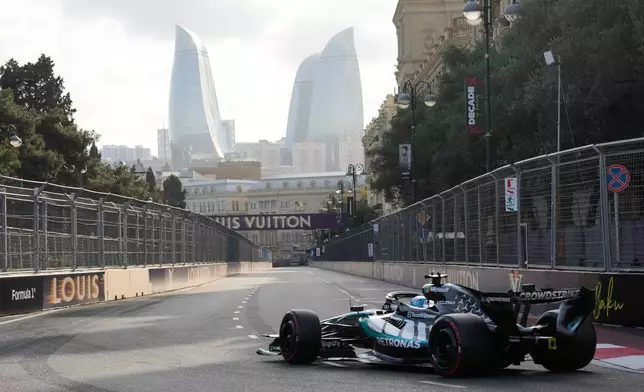 Mercedes driver George Russell of Britain steers his car during the qualifying session for the Azerbaijan F1 Grand Prix, in Baku, Azerbaijan, Friday, Sept. 25, 2026. (AP Photo/Darko Bandic)