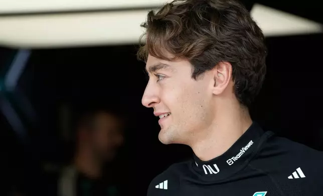 Mercedes driver George Russell of Britain smiles during the third free practice ahead of the Azerbaijan F1 Grand Prix, in Baku, Azerbaijan, Friday, Sept. 25, 2026. (AP Photo/Darko Bandic)