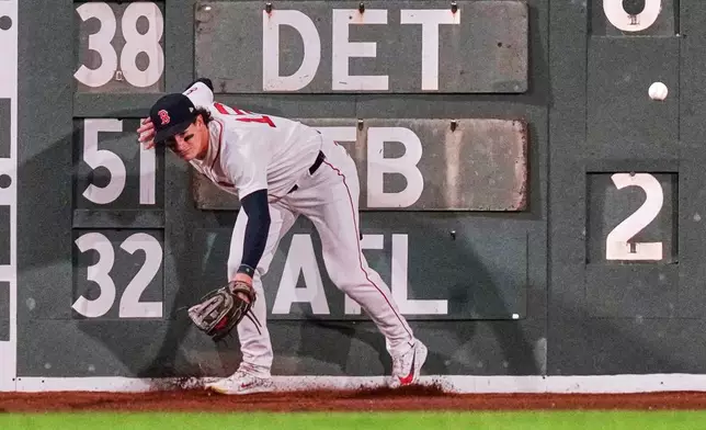 Boston Red Sox's Roman Anthony (19) misses making the play on a double by Los Angeles Angels' Travis D'Arnaud during the fifth inning of a baseball game, Tuesday, Sept. 8, 2026, in Boston. (AP Photo/Charles Krupa)-