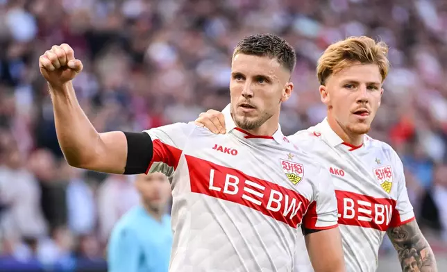 Stuttgart's Ermedin Demirovic, left, celebrates after scoring his side's second goal during the Champions League opening phase soccer match between VfB Stuttgart and Viking FK in Stuttgart, Germany, Wednesday, Sept. 9, 2026. (Harry Langer/dpa via AP)