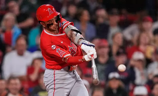 Los Angeles Angels' Zach Neto connects on a three-run home run during the third inning of a baseball game against the Boston Red Sox, Wednesday, Sept. 9, 2026, in Boston. (AP Photo/Charles Krupa)