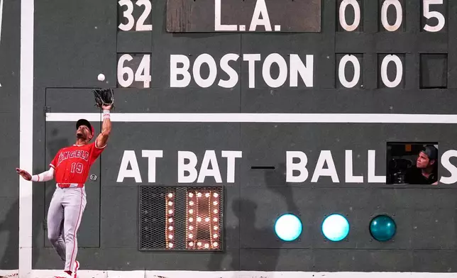 Los Angeles Angels' Kyren Paris fields a fly out by Boston Red Sox's Nate Eaton during the third inning of a baseball game, Wednesday, Sept. 9, 2026, in Boston. (AP Photo/Charles Krupa)