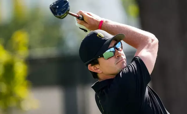 International teams' Nico Echavarria, of Columbia, hits from the third tee during a Presidents Cup golf tournament final round singles match against the USA team at Medinah Country Club, Sunday, Sept. 27, 2026, in Medinah, Ill. (AP Photo/Chris Carlson)