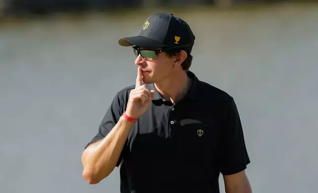 International teams' Nico Echavarria, of Columbia, gestures after winning the 16th hole during a Presidents Cup golf tournament final round singles match against the USA team at Medinah Country Club, Sunday, Sept. 27, 2026, in Medinah, Ill. (AP Photo/Chris Carlson)
