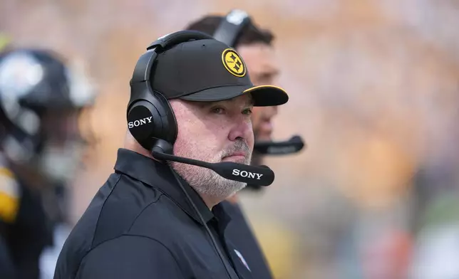 Pittsburgh Steelers head coach Mike McCarthy runs calls on the sideline during an NFL football game against the Atlanta Falcons, Sunday, Sept. 13, 2026, in Pittsburgh. (AP Photo/Gene J. Puskar)