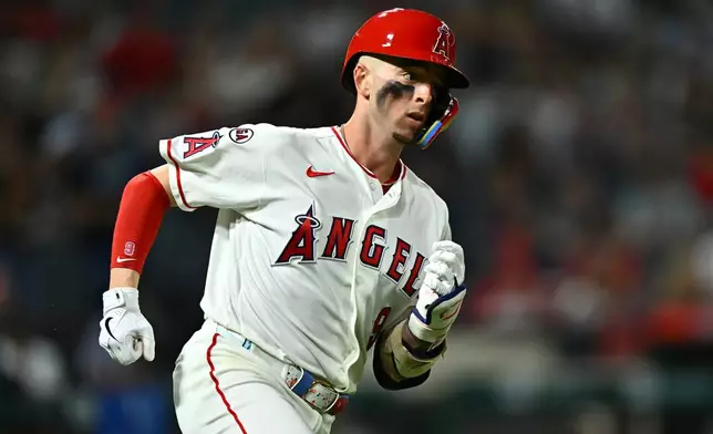 Los Angeles Angels' Zach Neto runs after hitting a triple during the third inning of a baseball game against the Seattle Mariners, Monday, Sept. 14, 2026, in Anaheim, Calif. (AP Photo/William Liang)