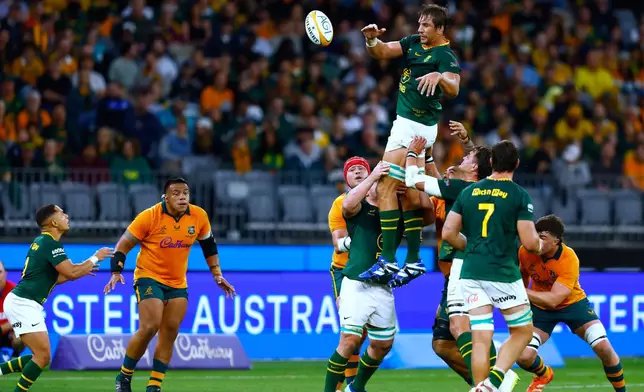 South Africa's Eben Etzebeth, top, wins a line out against Australia during their rugby union test match in Perth, Australia, on Sunday, Sept. 27, 2026. (AP Photo/Gary Day)