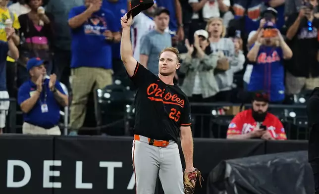 Baltimore Orioles' Pete Alonso gestures to fans before a baseball game against the New York Mets Monday, Sept. 14, 2026, in New York. (AP Photo/Frank Franklin II)