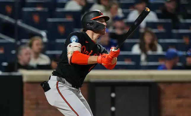 Baltimore Orioles' Gunnar Henderson follows through on a home run during the eighth inning of a baseball game against the New York Mets Monday, Sept. 14, 2026, in New York. (AP Photo/Frank Franklin II)