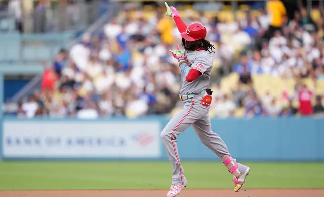 Cincinnati Reds' Elly de la Cruz head to second after hitting a solo home run during the first inning of a baseball game against the Los Angeles Dodgers, Monday, Sept. 7, 2026, in Los Angeles. (AP Photo/Mark J. Terrill)