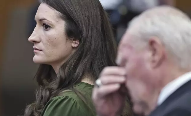 Lindsay Clancy watches jury members as Judge William Sullivan polls them before they start deliberations during her murder trial at Plymouth Superior Court in Plymouth, Mass., Monday, Aug. 31, 2026. (Greg Derr/The Patriot Ledger via AP, Pool)