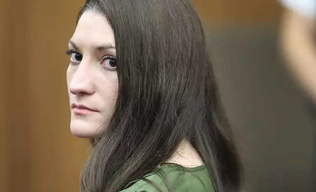 Lindsay Clancy watches jury members as Judge William Sullivan polls them during her murder trial at Plymouth Superior Court in Plymouth, Mass., Monday, Aug. 31, 2026. (Greg Derr/The Patriot Ledger via AP, Pool)
