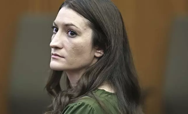 Lindsay Clancy watches jury members as Judge William Sullivan polls them before they start deliberations during her murder trial at Plymouth Superior Court in Plymouth, Mass., Monday, Aug. 31, 2026. (Greg Derr/The Patriot Ledger via AP, Pool)