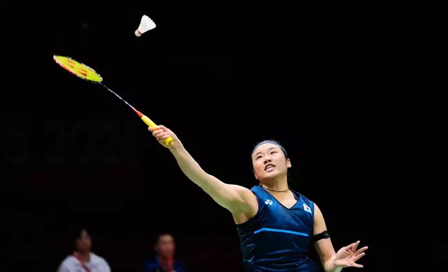 South Korea's An Se-young Japan's plays a return against Japan's Akane Yamaguchi during their women's singles badminton final match at the Asian Games in Ichinomiya, Japan, Tuesday, Sept. 29, 2026. (AP Photo/Dita Alangkara)