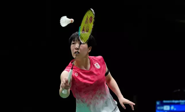 Japan's Akane Yamaguchi plays a return against South Korea's An Se-young during their women's singles badminton final match at the Asian Games in Ichinomiya, Japan, Tuesday, Sept. 29, 2026. (AP Photo/Dita Alangkara)