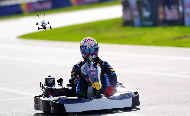 Red Bull's F1 driver Max Verstappen takes a practice lap in his go-kart ahead of the Max v 100 go-karting event at Silverstone, Wednesday, Sept. 16, 2026, in Towcester, England. (Bradley Collyer/PA via AP)
