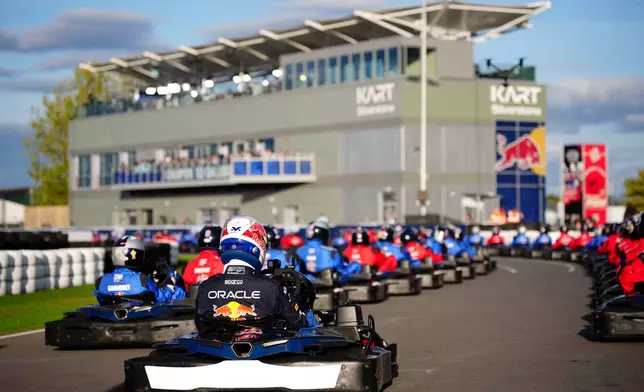 Red Bull's F1 driver Max Verstappen starts from the back of the grid ahead of the Max v 100 go-karting event at Silverstone, Wednesday, Sept. 16, 2026, in Towcester, England. (Bradley Collyer/PA via AP)