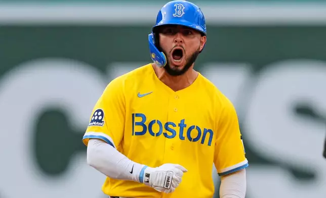 Boston Red Sox's Wilyer Abreu celebrates after his two RBI double during the sixth inning of a baseball game against the Kansas City Royals, Saturday, Sept. 12, 2026, in Boston. (AP Photo/Charles Krupa)