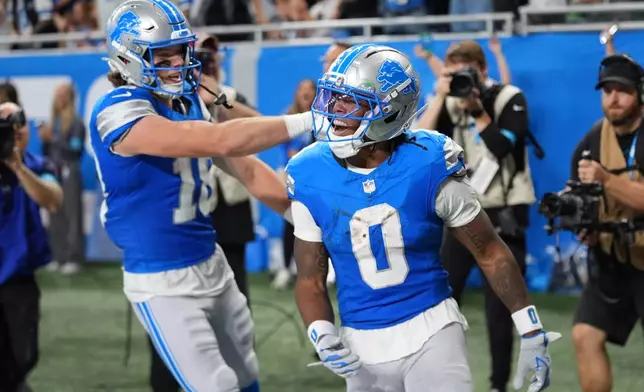 Detroit Lions' Jahmyr Gibbs celebrates his touchdown run during the second half of an NFL football game against the New York Jets in Detroit, Sunday, Sept. 27, 2026. (AP Photo/Paul Sancya)